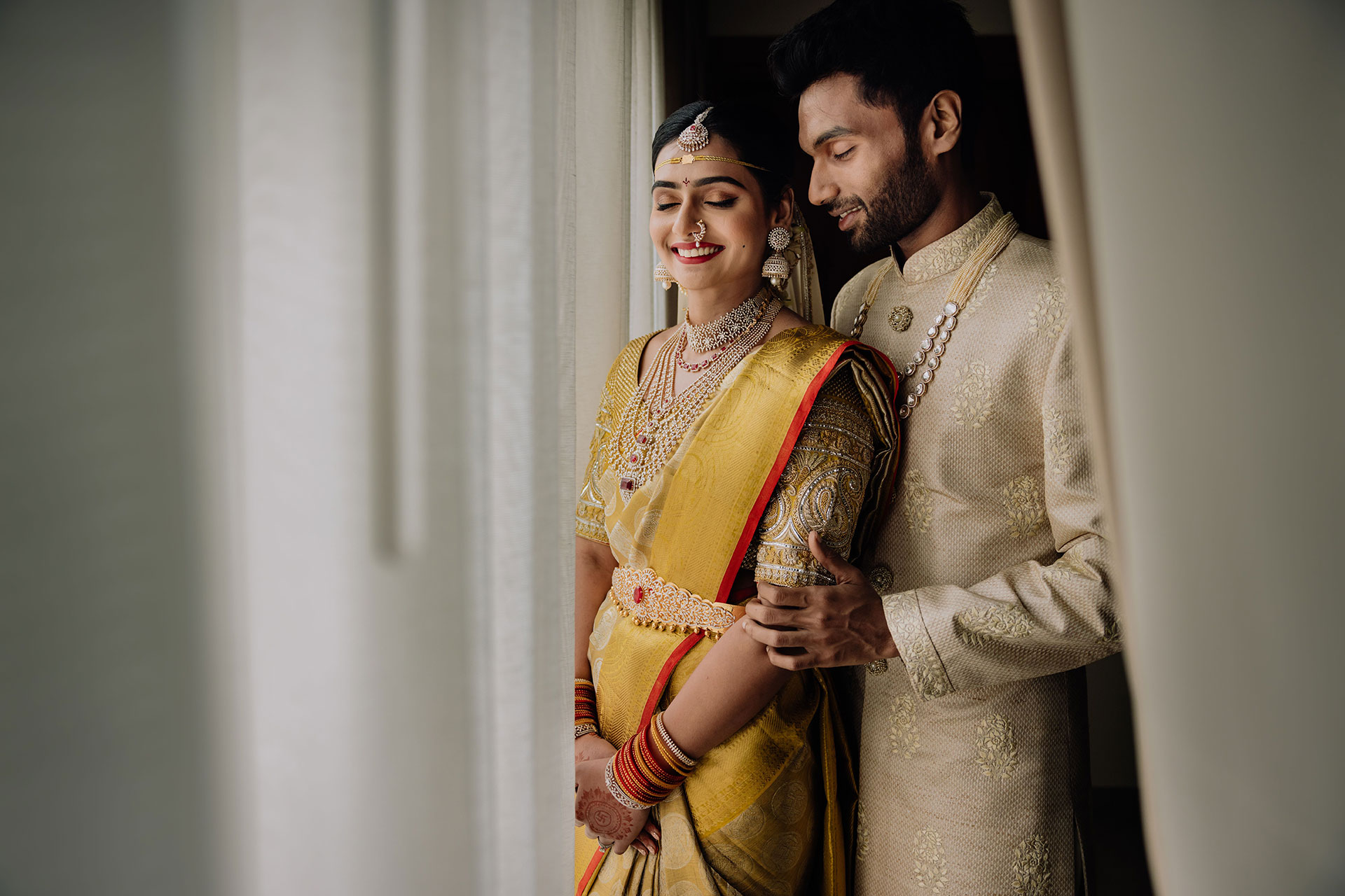 Indian wedding couple poses of Akhila and Pranay by the Bangalore's Top wedding photographer, Arjun Kamath